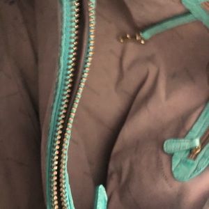 Brahmin pocketbook with many compartments.